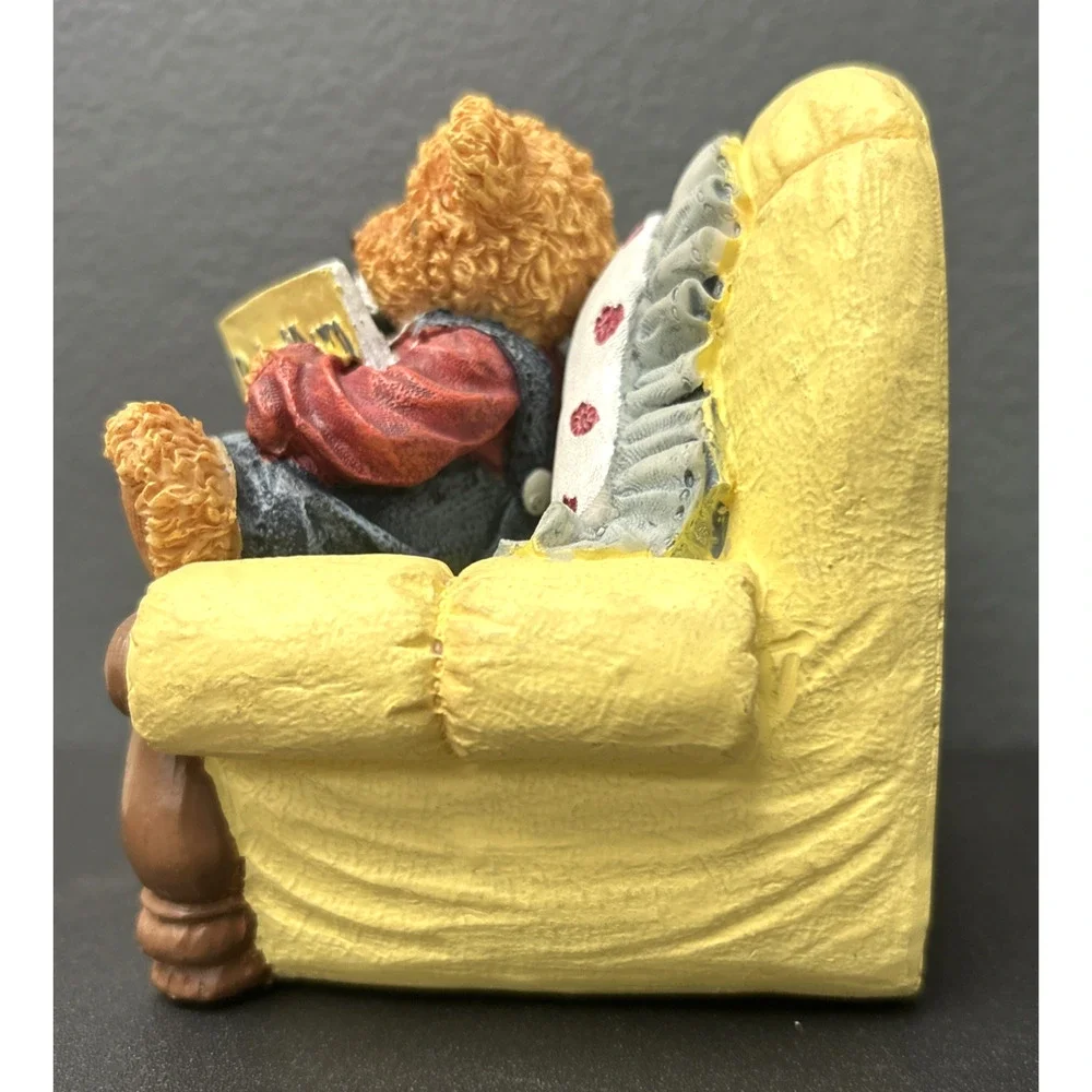 Baby Bear Sitting In Yellow Chair Reading Book With Stuffed Animal Toy Figurine